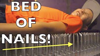 ?LAYING ON A BED OF NAILS!