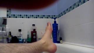 Candid feet in bath