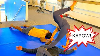 Ball Busting Fight Action In A  Female Fight Scene As Skilled female martial artist groin kicks.