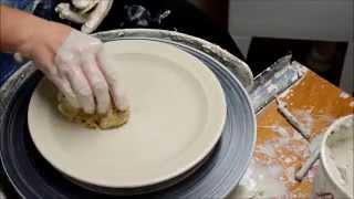 Throwing a Plate on the Potter's Wheel