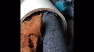 Outdoor wood burning furnace heats hot tub