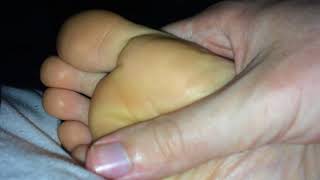 Girlfriend's sleeping feet on chest
