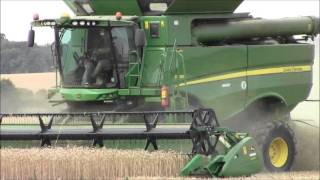 John Deere s690i combing,Harvest 2013.wvm