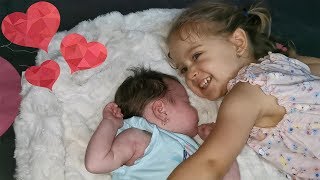 Cute Little Girl Take Care of her Baby Sister