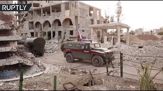 RAW: Russian military police start patrolling streets of Douma, Syria