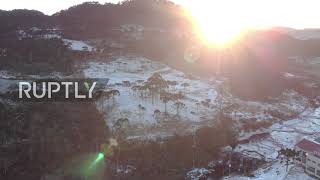 Brazil: Drone footage shows unexpected snowfall in southern town amid cold snap