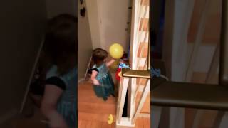 5th Birthday girl popping balloons after her party