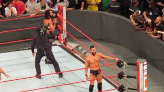 Seth Rollins, Finn Balor and Jeff Hardy playing with beach balls.