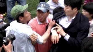 이석기 '봉변'...농민들에게 멱살 잡혀