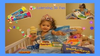 Cute little girl practicing to read and count