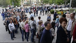 E. Ukraine decides: Long queues to vote in referendum for autonomy from Kiev