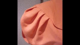 Цельнокроеный рукав со складками от кокетки.