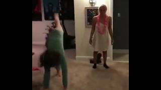 Two Drunk Women attempting Handstands
