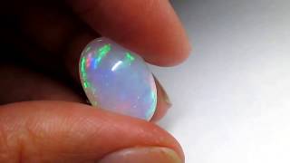 Big Ethiopian opal 13x19 oval 10.53 ct code 8969 Крупный эфиопский опал 13х19 овал 10.53 карат