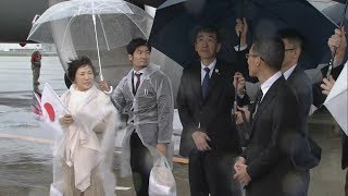 Выйти сухим: как лидеры G20 спасаются от ливня в японской Осаке