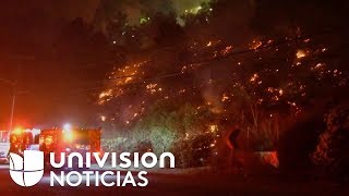 Los vientos de Santa Ana avivan una serie de incendios forestales en el sur de California