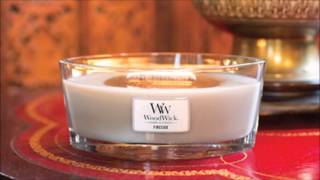 Burning woodwick candle and foam