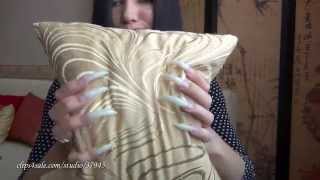 Noir Plaisir Torturing a Pillow With Long Nails