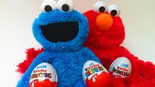 Elmo & Cookie Monster unwrapping Kinder Surprise Eggs Sesame Street
