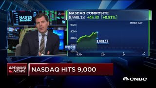 Nasdaq hits 9,000 for the first time