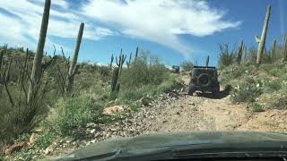 Mn guys and gals riding around the Arizona desert.