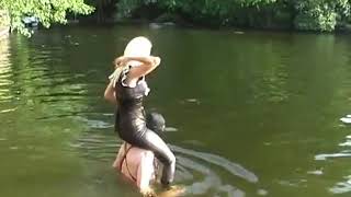 Boy slave given shoulder ride to here sexy mistress in river