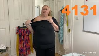 ADELESEXYUK DOING A QUICK ADVERT ABOUT HER BLACK TOP
