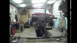 Кантователь кузова автомобиля.