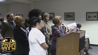 County welfare workers storm freeholder meeting