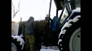 Запуск трактора зимой  -14 после двух недельной стоянки