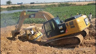 អាប៊ុលជាប់ផុងក្នុងភក់ - bulldozer stuck in deep mud & recovery