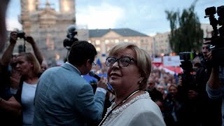 Poland’s top judge turns up for work defying retirement order
