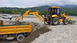 Mahindra Dozer Loading Gravel in Truck - Dozer Video