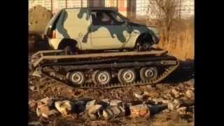 Снегоход Ока на гусеницах.