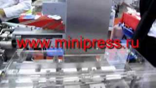 Упаковочная машина в полиэтиленовую пленку www.minipress.ru