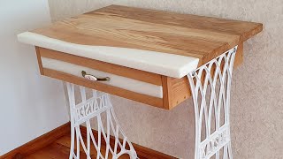 Epoxy table with sewing machine legs