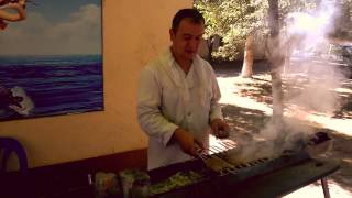 Uzbek shashlik grilling at Tashkent zoo