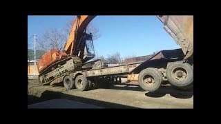 долгая погрузка эксковатора на трал