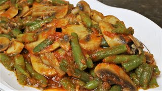 Salteado de champiñones y judías verdes con tomate