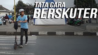 CARA NAIK SKUTER ELEKTRIK YANG AMAN
