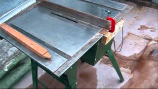 вариант настольной циркулярки из ручной пилы . Сonveyers desktop version of a handsaw