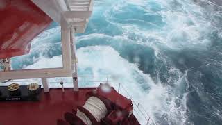 cargo ship in storm at kuril islands