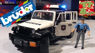 BRUDER Полицейская машинка Джип. Распаковка игрушки Брудер от Игорька BRUDER Jeep Wrangler Rubicon