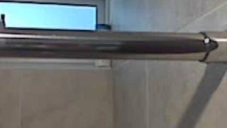 División para Baño en Acero de Barra Deslizante