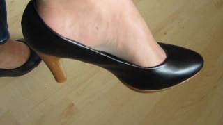 black leather pumps, nylons and jeans, shoeplay