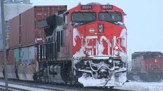 CN Train Spotting HD: ET44AC! | CN 2948 & DPU 3004 Leads CN Q106 East Passing CN 5242 2/4 12/23/15
