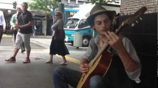 Awesome Latin guitarist busking in Auckland city!!