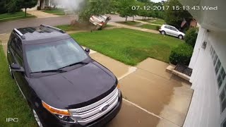 Watch a stolen vehicle take out tree, flip in metro Detroit neighborhood