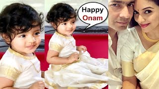 Asin Thottumkal Daughter Arin Looks Cute In White Lehenga-Choli At Onam Celebration