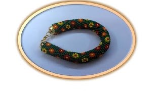 Как связать крючком браслет-жгут из бисера "Цветочная гирлянда"?